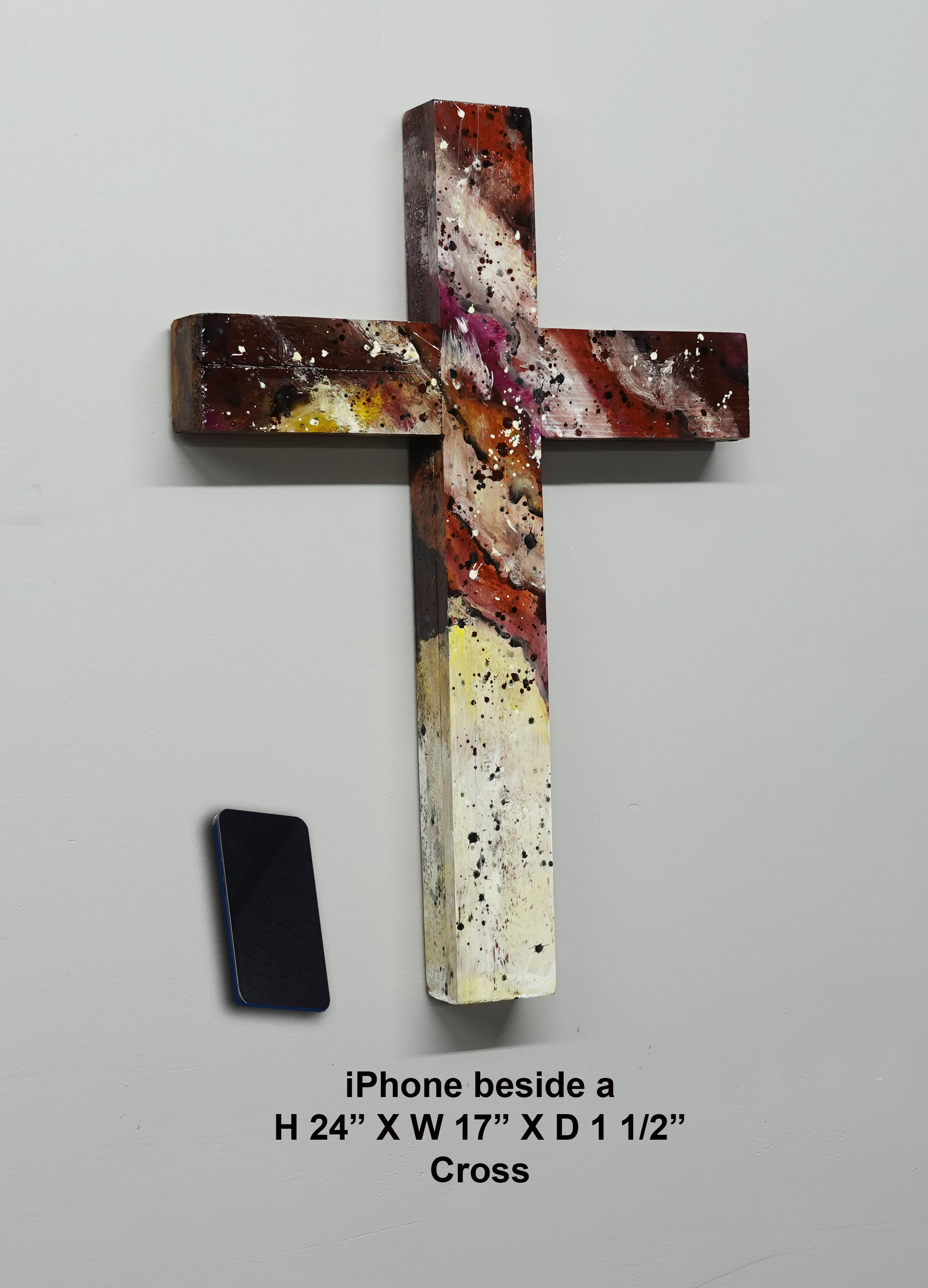 iPhone beside a handmade wooden cross — H 24" × W 17" × D 1½"